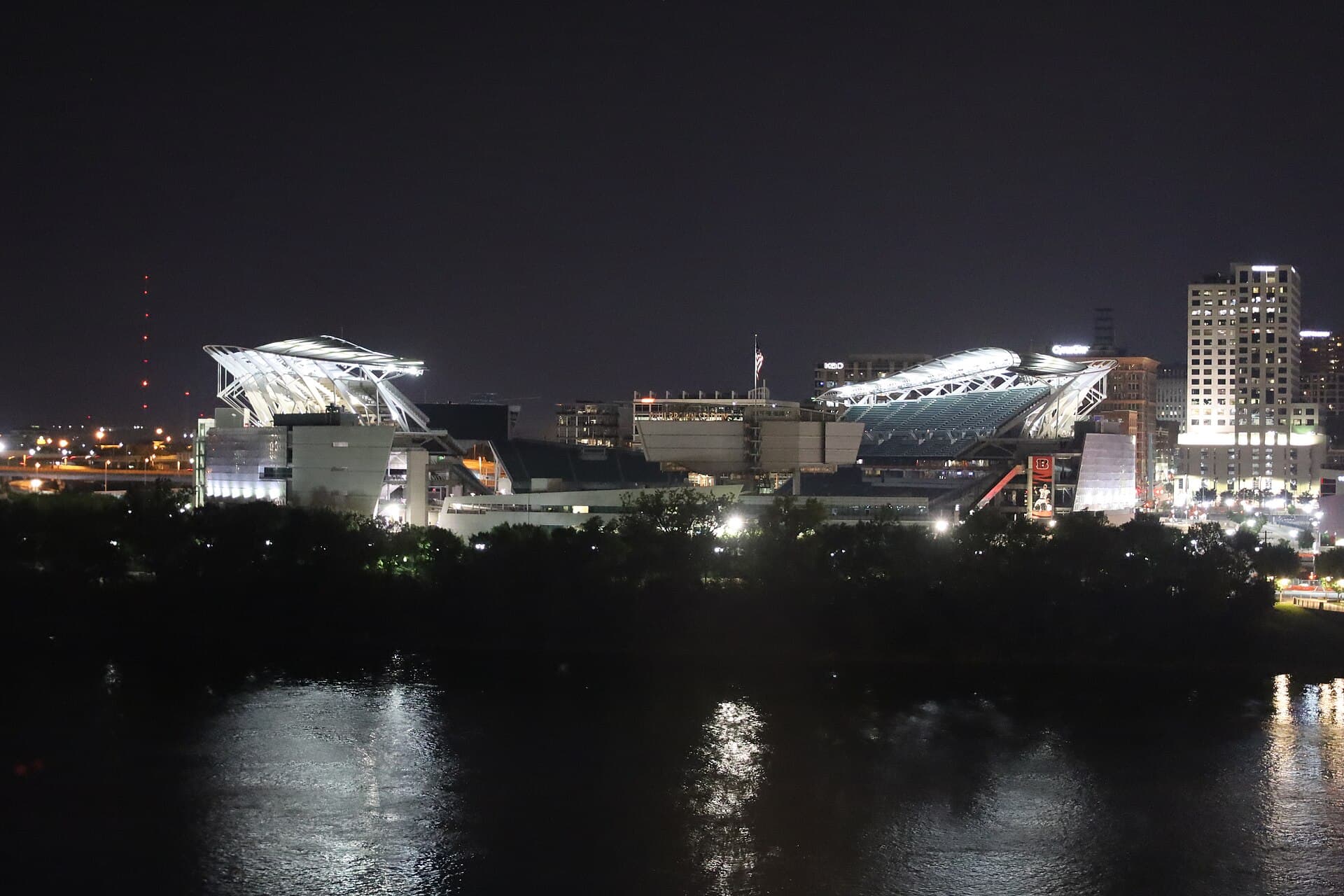Cincinnati's stadium lit up at night, one of the Buccaneers' 2026 road trips.